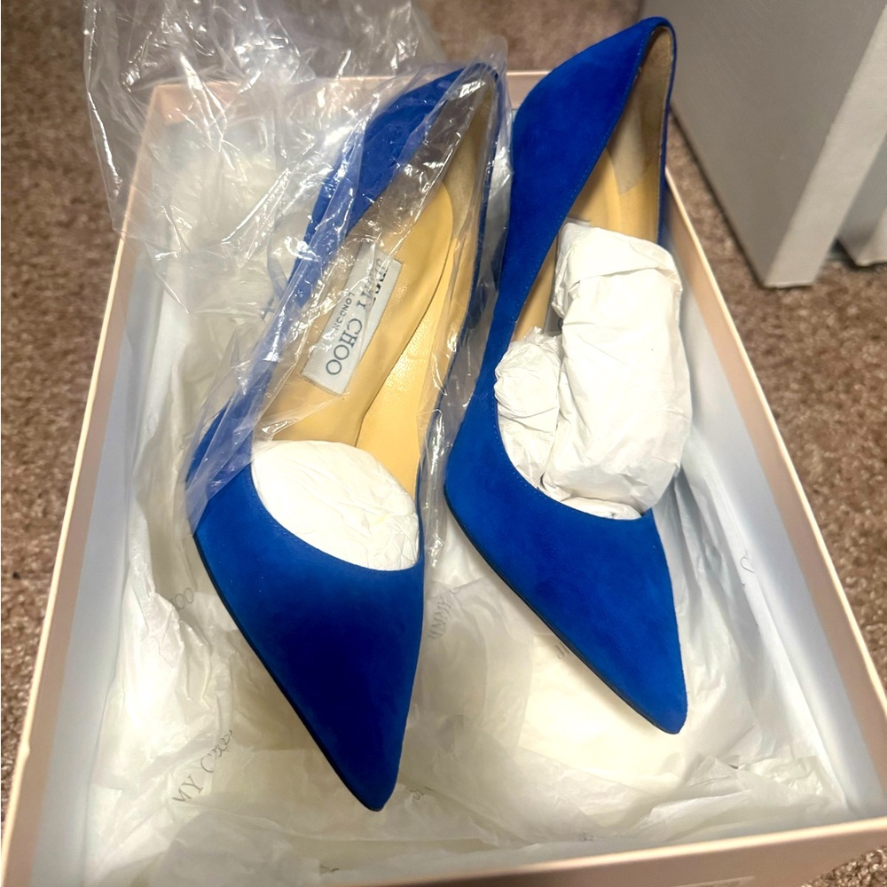 This is a suede blue JIMMY CHOO PUMP
